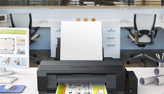 O imprimanta A3+ compacta cu 4 culori